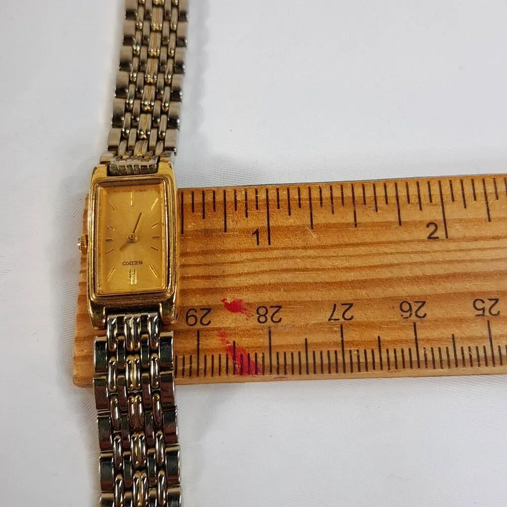 Vintage Seiko Watch Women Gold Tone Gold Dial Rectangle bracelet 2E20-7023 dress